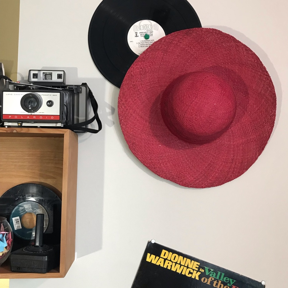 Red woven hat with design